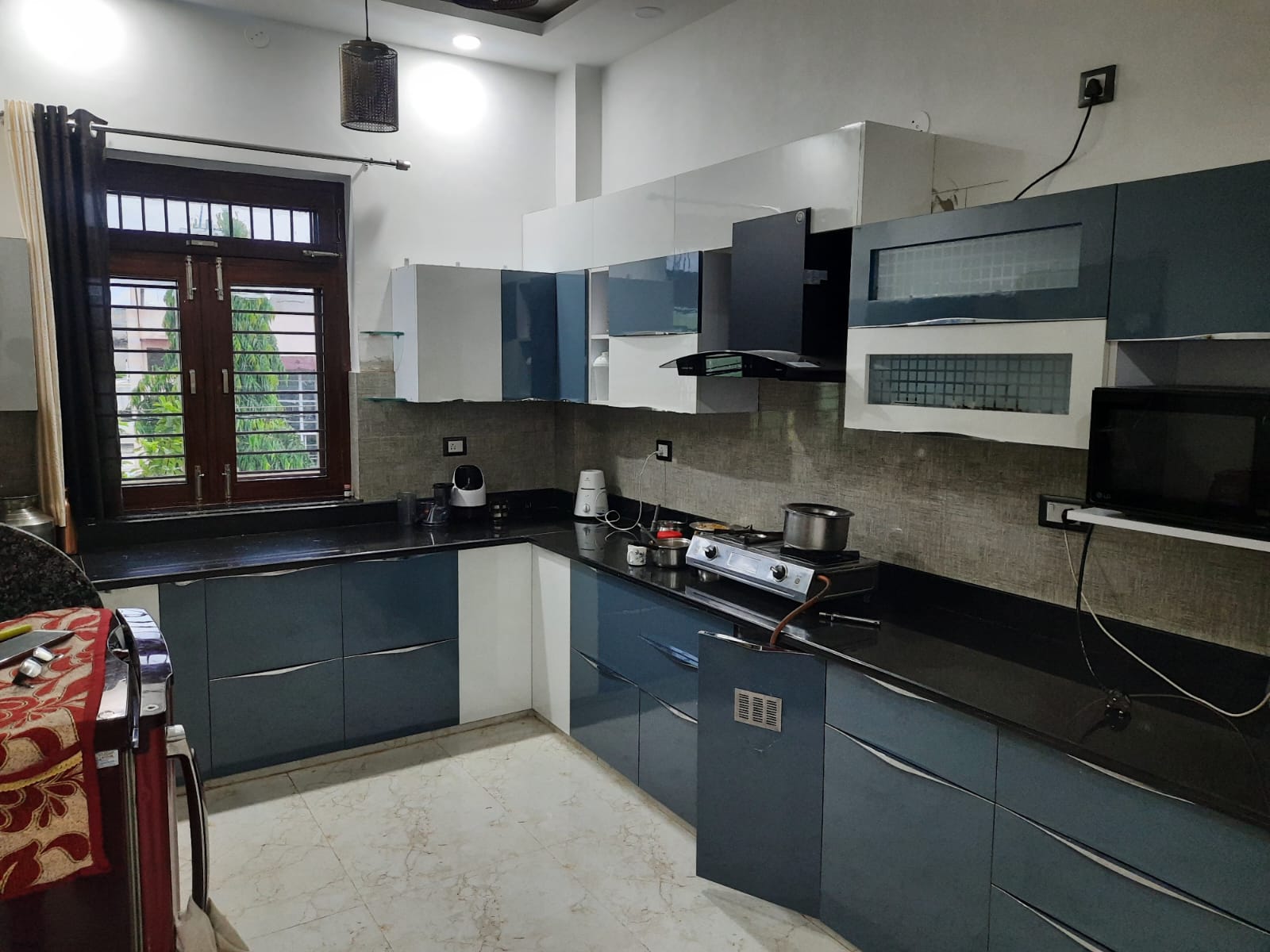 Slate blue and white contemporary kitchen close-up Bharatpur